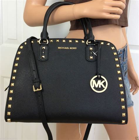 black and gold michael kors|michael kors black leather tote.